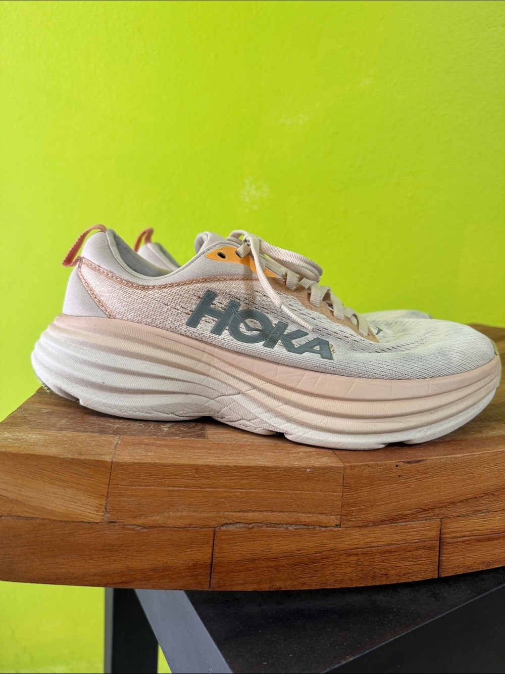 Hoka Women’s Running Shoe in Pink and White with Gray Logo